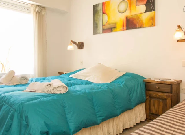 Amplio dormitorio - departamentos de alquiler por día